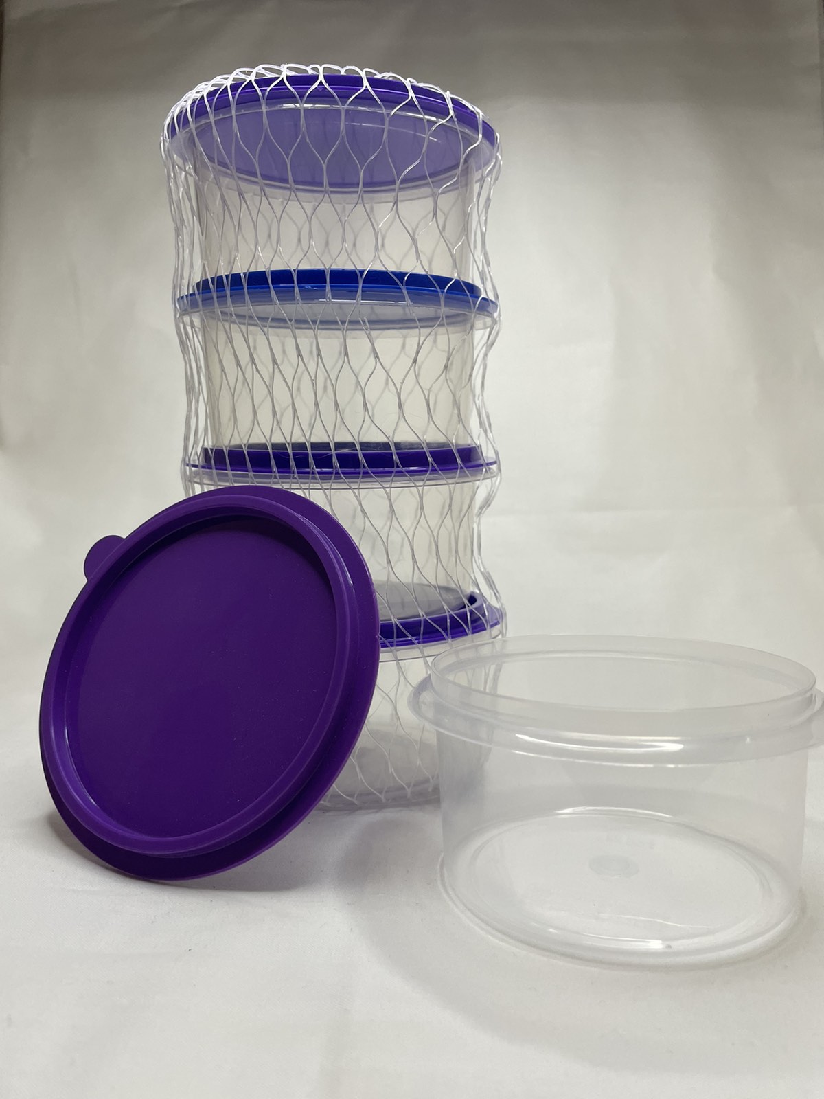 Πλαστικά δοχεία αποθήκευσης 4 τεμάχια σε διχτάκι 200 ml φ10χ 5,5